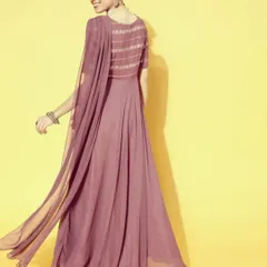 The back view of the mauve saree-dress, highlighting the flowing attached pallu and the sequin work on the bodice. The lightweight georgette fabric ensures comfort and graceful movement.