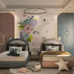 A charming shared bedroom for two kids with matching beds, a whimsical unicorn wall mural, and modern hanging pendant lights. The design creates a magical and coordinated space.