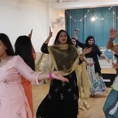 Students enjoying a festive dance session during our Diwali event. Everyone is dressed in beautiful traditional attire, adding to the celebratory atmosphere of the festival of lights.