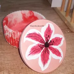 A custom order for a lovely customer: a hand-painted lily on the lid of our round marble jar. We love bringing your creative ideas to life.