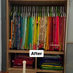 Here is the stunning result. By using uniform hangers and arranging the sarees by color, the collection is now beautifully displayed, protected, and easy to browse.