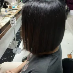 This angle shows how a classic bob sits neatly at the nape of the neck. It's a timeless style that exudes confidence.