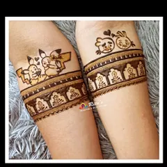Your mehendi can be fun too! This bride wanted to include her favorite things, so I created custom Pikachu and Angry Birds armbands. If you have a quirky idea, whether it's a cartoon or your favorite food, I can weave it into your design.