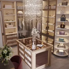 A different view of the crystal chandelier closet, showing the vanity nook with a lily bouquet and the detailed craftsmanship of the central island.