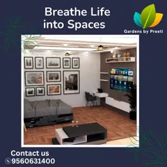 This modern living room design focuses on clean lines and a neutral color palette. We used a gallery wall of black and white photos, a comfortable sectional sofa, and integrated shelving to create a stylish yet functional space.