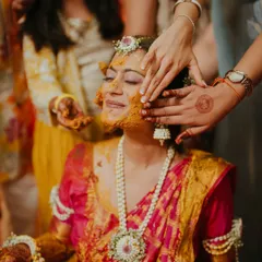 The bride glows as she is blessed with haldi by her loved ones. We manage the event flow so you can soak in these precious, candid moments without a worry.