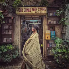 I love giving vintage a modern story. Here, I styled a classic Banarasi saree for a retro-themed shoot at Delhi's iconic Faqir-Chand bookstore. The goal was to create a timeless, nostalgic mood that feels straight out of a classic film.