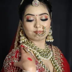 The focus here is on creating a luminous bridal glow. Students master highlighting and contouring techniques to enhance the bride's natural features for her wedding day.