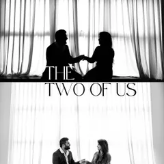 A classic window-lit silhouette, capturing a quiet, intimate moment between the couple during their pre-wedding shoot.