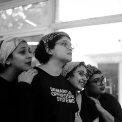 The cast of "The House of Bernarda Alba" shares a moment during rehearsals. The camaraderie of the ensemble is essential to our productions.