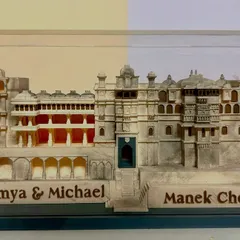 The personalized wedding keepsake from another angle, showcasing the couple's names and the iconic venue, making it a truly special memento.