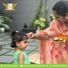 A warm welcome to our festive celebrations. We embrace traditions by greeting each child with a tilak, filling our space with joy and a sense of belonging.