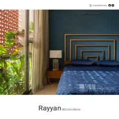 A closer view of the custom headboard and jali window in the Rayyan bedroom, showcasing the connection to the outdoor greenery.