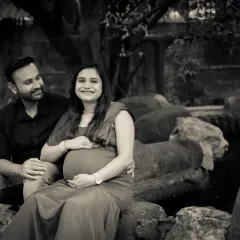 A quiet, happy moment between a couple, captured in timeless black and white. This style emphasizes their expressions and the peaceful atmosphere.