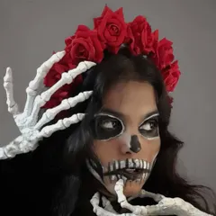Another angle of the Calavera Catrina makeup. The look required detailed line work and contouring to create the skull effect, which I designed and executed as part of the overall styling.