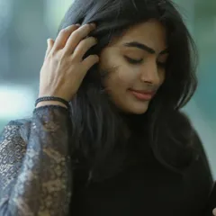 A candid moment captured during a shoot. My goal is to make you feel so comfortable that your natural beauty and personality shine through.
