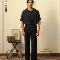 This look from Struct's AW'24 collection was shot against our versatile in-house room set, providing a clean and classic background that complements the menswear aesthetic.