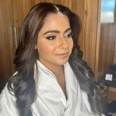 A sneak peek of the wedding day glam. This is the 'getting ready' stage, where we build the foundation for a surreal and luminous final look.