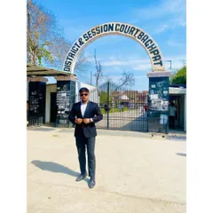 At the gate of the District & Session Court in Baghpat. My services extend throughout the entire NCR, including the courts of Uttar Pradesh.
