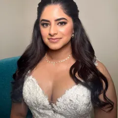 A truly radiant bride, inside and out. This portrait captures her happy glow, with soft makeup that enhances her natural beauty for her wedding day.