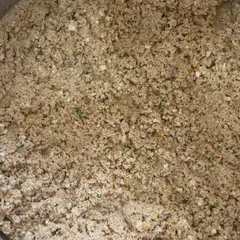 Get a close-up look at the texture of our fresh food. You can see the real, minced ingredients because it's made from them. This is what gently cooked, preservative-free dog food is supposed to look like.