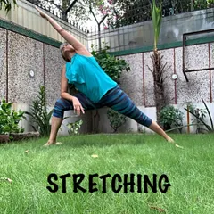 Practicing a deep side angle stretch outdoors. The fresh air and natural surroundings enhance the energizing effects of the pose.