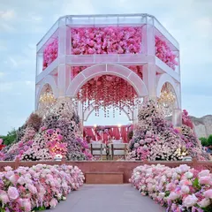 The sheer scale of this pink floral mandap is breathtaking. I designed it to be an immersive experience, with blooms covering every surface, creating a true floral paradise for the wedding ceremony.