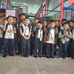 I love hosting school field trips. A group of students poses for a photo, happy and safe after a day of fun. Our staff ensures that group visits are organized, supervised, and full of joy.