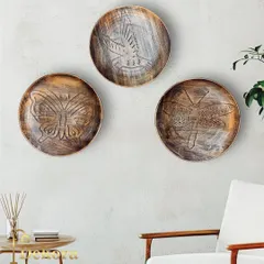 This set of three creative wall decor plates is a simple way to create an artistic focal point.