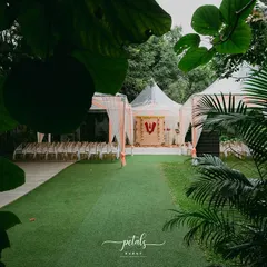 The Nalugu ceremony takes place in a beautiful outdoor setting, with the decor enhancing the natural beauty of the surroundings.