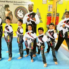 Team NMFA in a ready stance. We compete to better ourselves and support each other along the way.