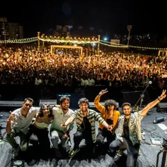 There's no feeling like looking out at a sea of happy faces and sharing the stage with my incredible band. This was at Signature Green Vibes with Oaff and Savera. I bring this collaborative energy and big stage experience to every corporate event, festival, and private gig.