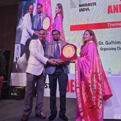 Dr. Kavish Chouhan receiving the Presidential Appreciation award from IADVL DSB for his role as the Trichology Workshop Chairperson at DERMAZONE. This recognizes his contribution to the field of dermatology.