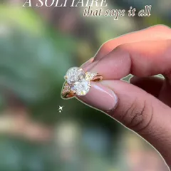 A solitaire that says it all. With its clean lines and quiet sparkle, this oval-cut diamond ring speaks of a love that is both elegant and profound.