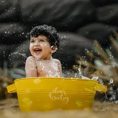 The purest joy is found in a splash. We capture these candid moments of laughter and fun, whether in our studio or outdoors, for memories that feel real and full of life.