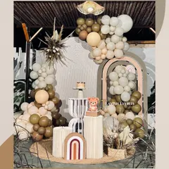 For a softer, trendy vibe, my boho teddy bear setups are a huge hit. I use a palette of earthy browns, creams, and greens with natural elements like pampas grass to create a warm and stylish party atmosphere.