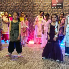 Another shot of our talented young students, Amayra and her friends, during a dance workshop. We focus on teaching expressions and stage presence from a young age.