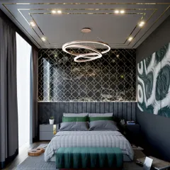 This bedroom design is all about drama and luxury. A black accent wall with intricate gold detailing serves as a stunning backdrop, while pops of emerald green and modern lighting create a space that is both bold and sophisticated.