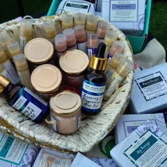 A heart-shaped basket filled with a variety of my handmade products. This is the kind of collection you can choose from when building a custom gift hamper for any occasion.