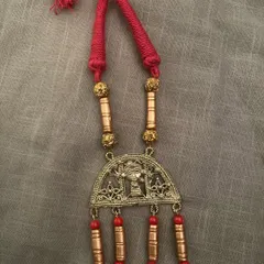 Another piece from my Dokhra collaboration. For this one, I used a red cord with antique gold beads and tubes to complement the intricate metalwork of the pendant.