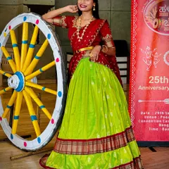 Here is the same popular half saree design, worn by singer Divya Ramachandra for a "Halli Habba" themed event. It shows how versatile this traditional outfit is, perfect for both personal functions and stage performances.