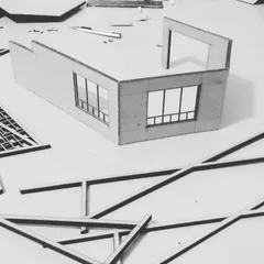 Another view of a work-in-progress architectural model. Building physical models allows me and my clients to visualize and refine details like window placements and wall openings before construction begins.