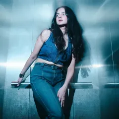 A more candid shot from the same denim series. This look is all about effortless cool, perfect for anyone wanting to nail the Y2K-inspired denim trend.