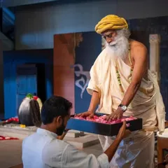 A sacred moment during the graduation ceremony, where Sadhguru offers his blessings. This consecrates our journey as teachers, empowering us to share this science with the world.