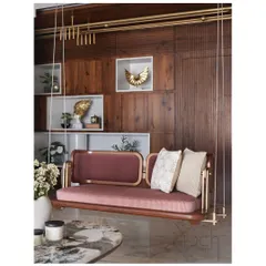 My forte is creating talked-about furniture like this reversible swing. Crafted from treated teak wood with a hand-waxed polish, its mauve upholstery and brass fixtures make it a sturdy and elegant centerpiece.