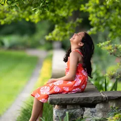 A moment of pure, uninhibited laughter. Even when kids get older and don't like to pose, we can still capture their true spirit in a natural setting.