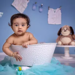 That moment you realize you forgot to brush your teeth before your bath! A funny and cute expression from this little one.