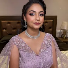 An angelic look for this beautiful engagement bride. She wanted a minimal yet classy glam, and this look with soft, shimmery eyes and a flawless base was the perfect fit.