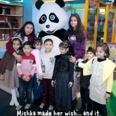 The whole party crew gathers for a memorable photo with our star panda. Mascot appearances are a fantastic way to elevate any birthday theme and excite all the guests.