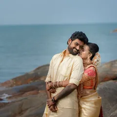 Capturing the warmth and affection of a beachside wedding. The bride's gentle whisper and the groom's happy smile tell a story of comfort, love, and the beginning of their journey by the sea.